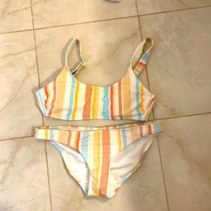 Never worn size medium in top and bottom bikini